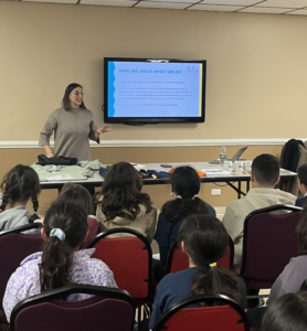 AYF Camp Haiastan executive director Kenar Charchaflian speaks to young community members in Chicago, February 11, 2023