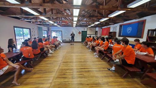 Unger Aram addressing the 2022 staff in the Fermanian Educational Center, known as the Rec Hall.